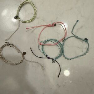 Colorful Braided Bracelet Set Pura Vida
Total of 5 bracelets